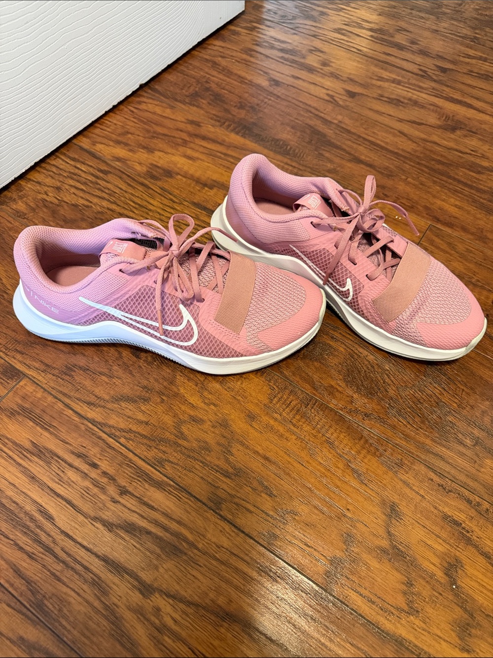 Nike Women’s Pink Mesh Running Shoes with White Swoosh